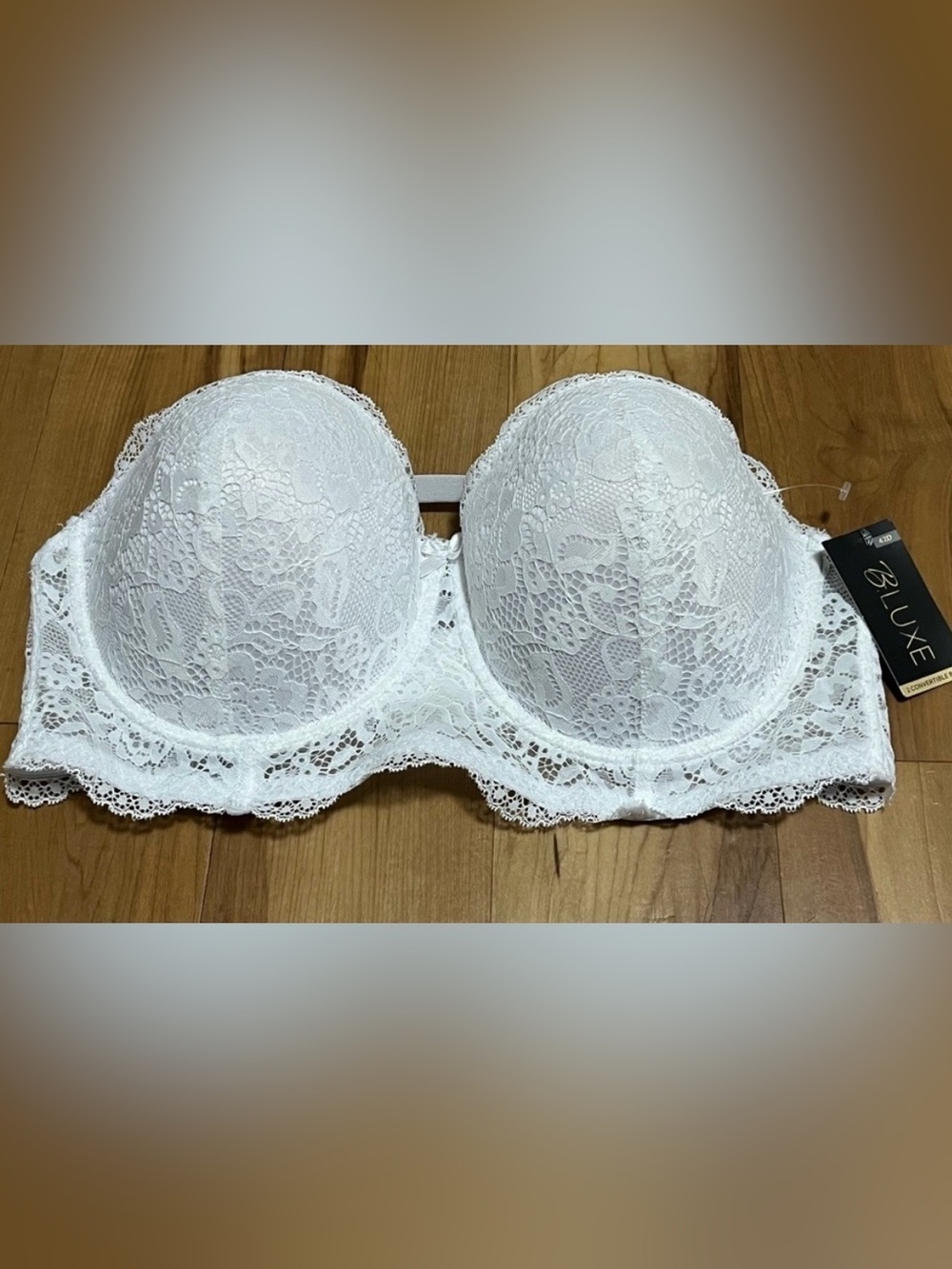 New without tags (NWOT) B.LUXE white lace longline strapless bra – size 42D.